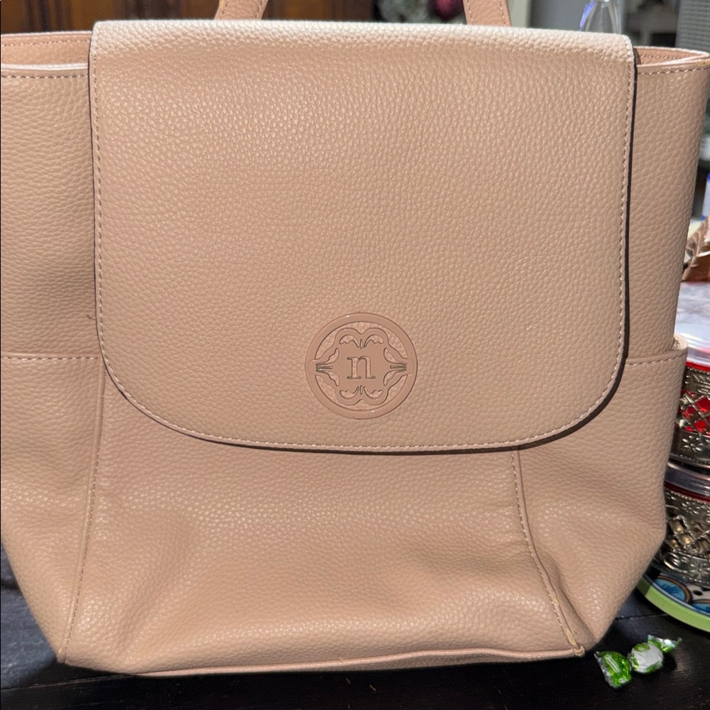 Nanette Lepore pebbled vegan leather backpack in a light pink or beige color. - Picture 5 of 9